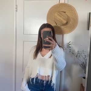 Distressed knit sweater